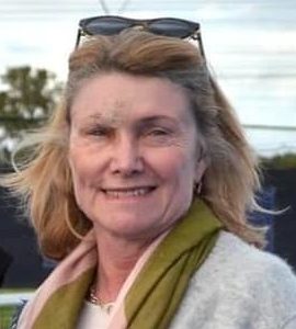 Pam Cresswell, President of Tennis West, pictured outdoors.